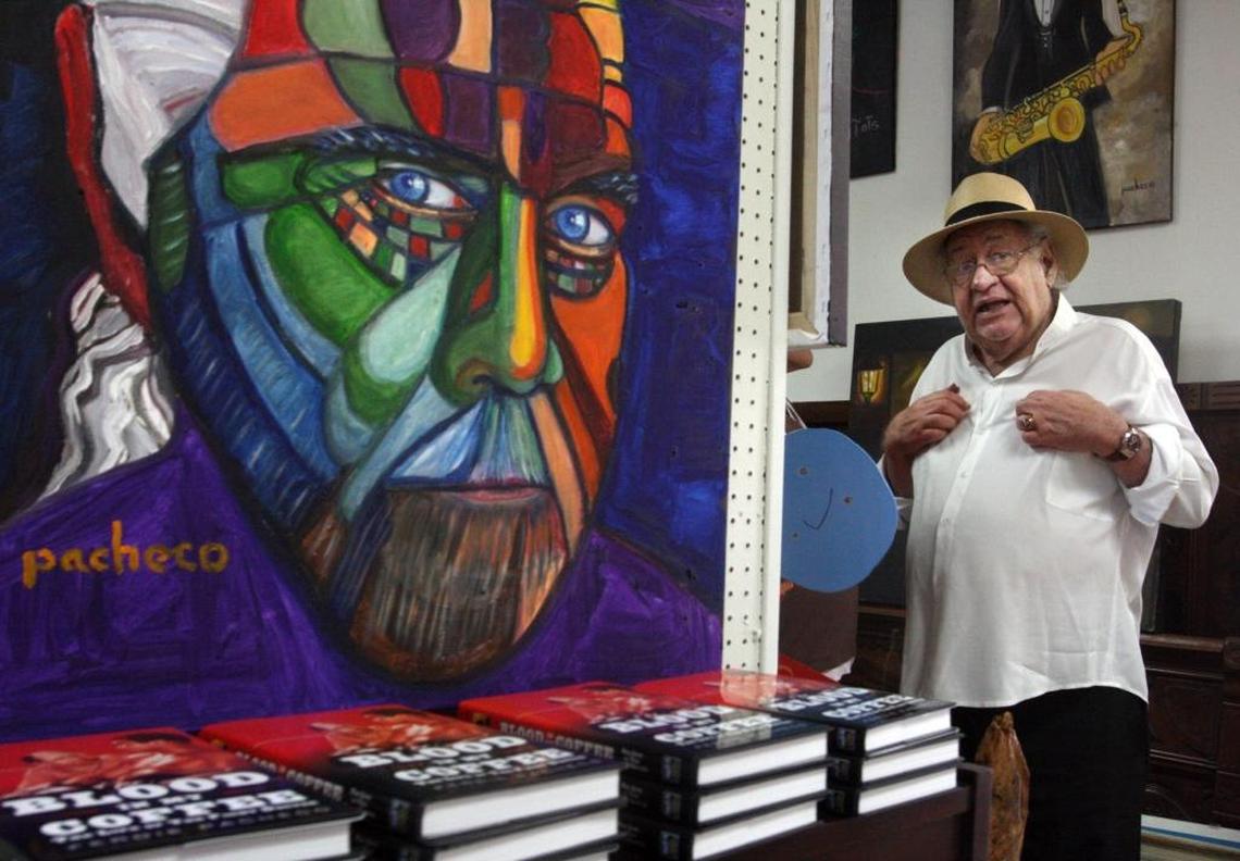 Artist Ferdie Pacheco discussed his art with fans during a reception on March 7, 2009, at Grace Cafe and Galleries in Dania Beach.