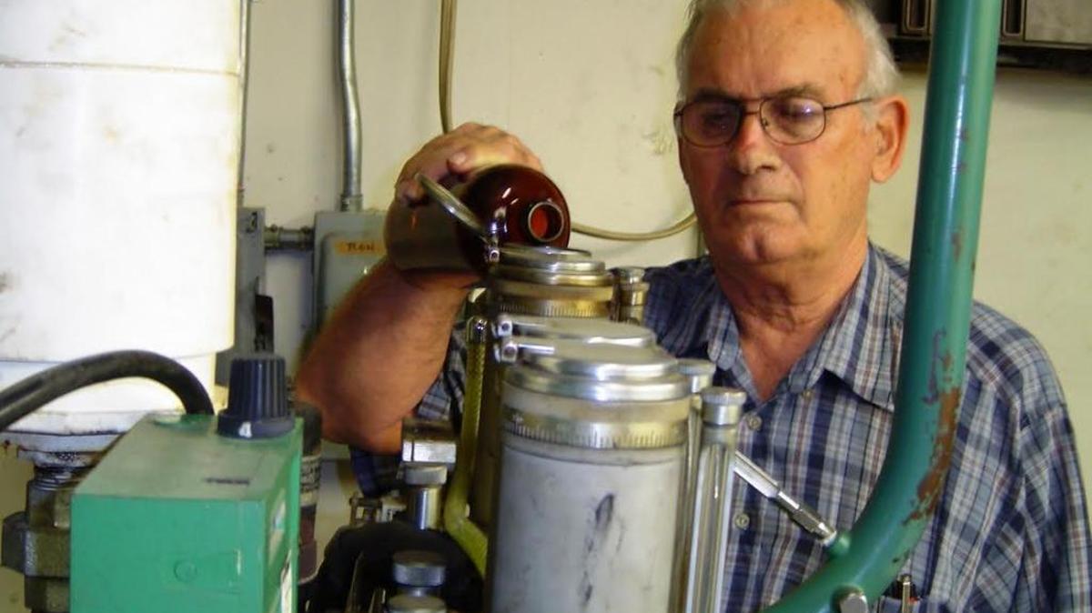 Carl Johnson, president of Panair Laboratory, started out with Pan Am as a mechanic and became an expert in fuel analysis.