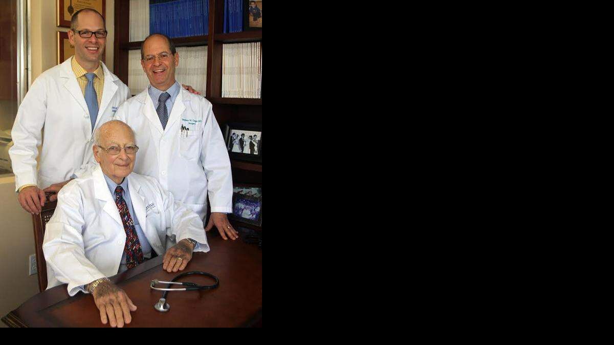 
FAMILY OF DOCTORS: Dr. Harold Unger (seated) began a family legacy of doctors at Mount Sinai Medical Center in Miami Beach. He is flanked by his sons Dr. Joshua Unger (top left) and Dr. Stephen Unger (top right).


