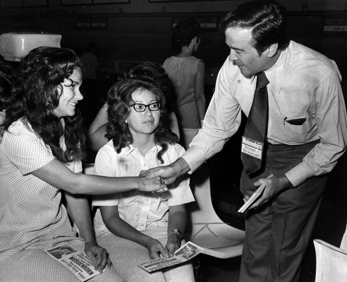 Sen. Lee Weissenborn, right, talks with Jean Taylor, Hialeah, and Chani Reiland of Carol City at Palm Springs Bowling Alley, while he was running for Congress in 1972.