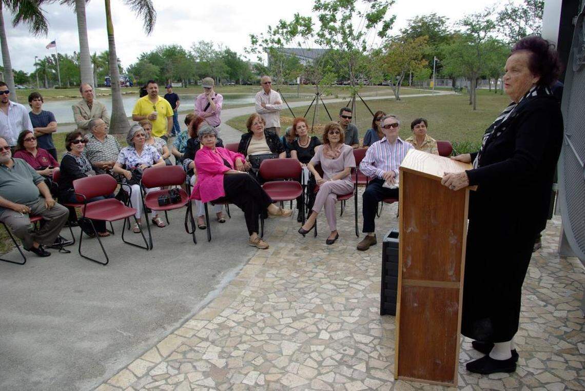 Mother of the park Roxcy O'Neal Bolton greets a crowd that gathered during the dedication ceremony for the new gates and fence sculptures at the Women's Park in Miami in March 2009.