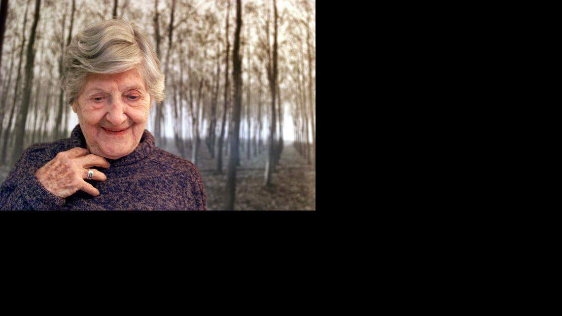 
PHOTOGRAPHER: Klara Farkas at her Coconut Grove home in front of one of her photographs in January 2003. Her daughter Georgette Ballance had put together a show of her mother's photographs at The Kampong that winter.
