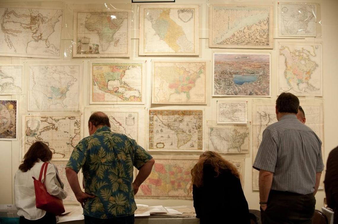 Visitors checked out some of the maps that were on display during the 20th annual Miami International Map Fair at HistoryMiami on Feb. 2, 2013.