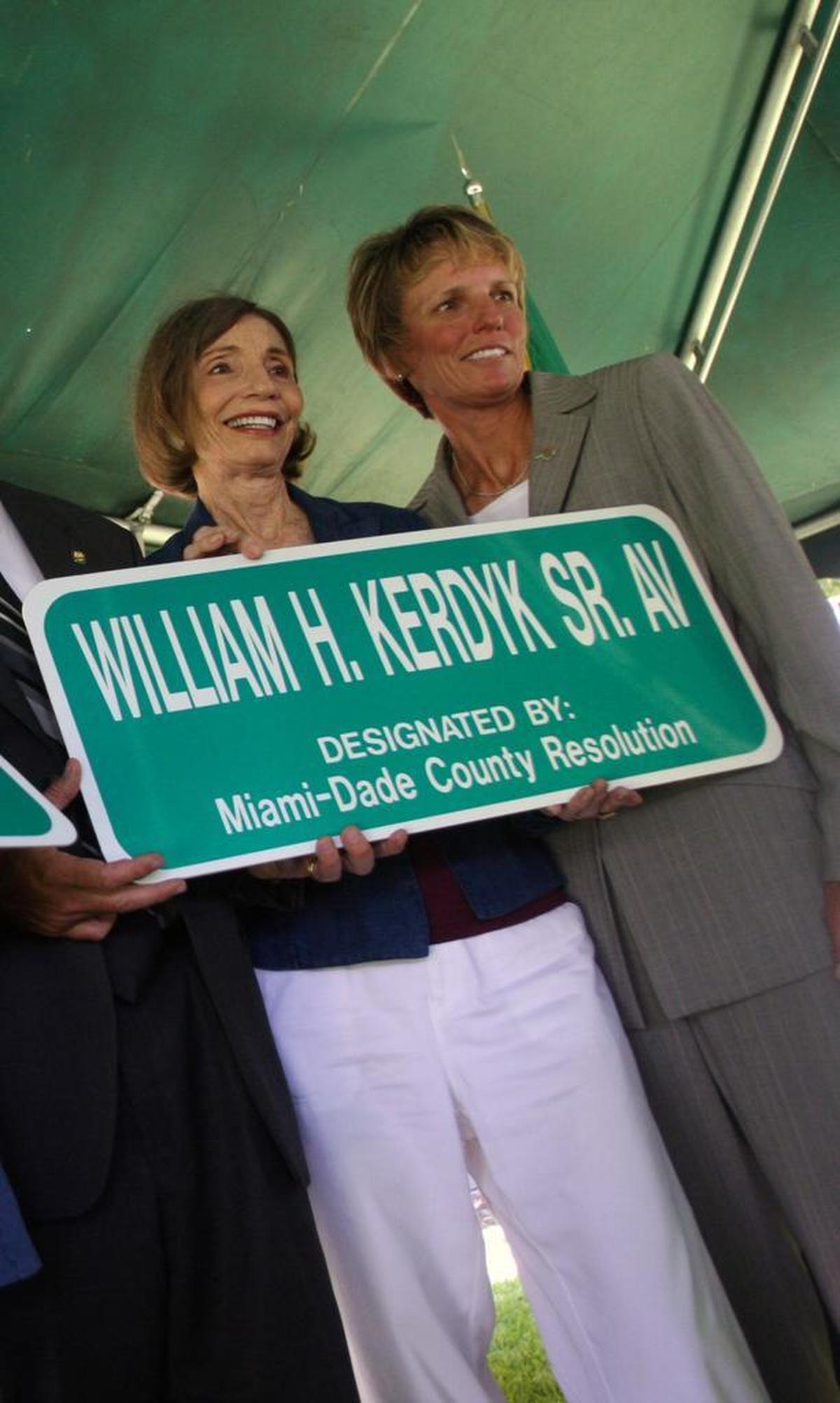 On May 27, 2009, family, friends and members of the local government joined together for the dedication of a portion of Douglas Road, between Southwest Eighth and 22nd streets to former Coral Gables Commissioner William H. Kerdyk Sr. Pictured from left, his wife Marlene Kerdyk and their daughter Tracy with the street sign.