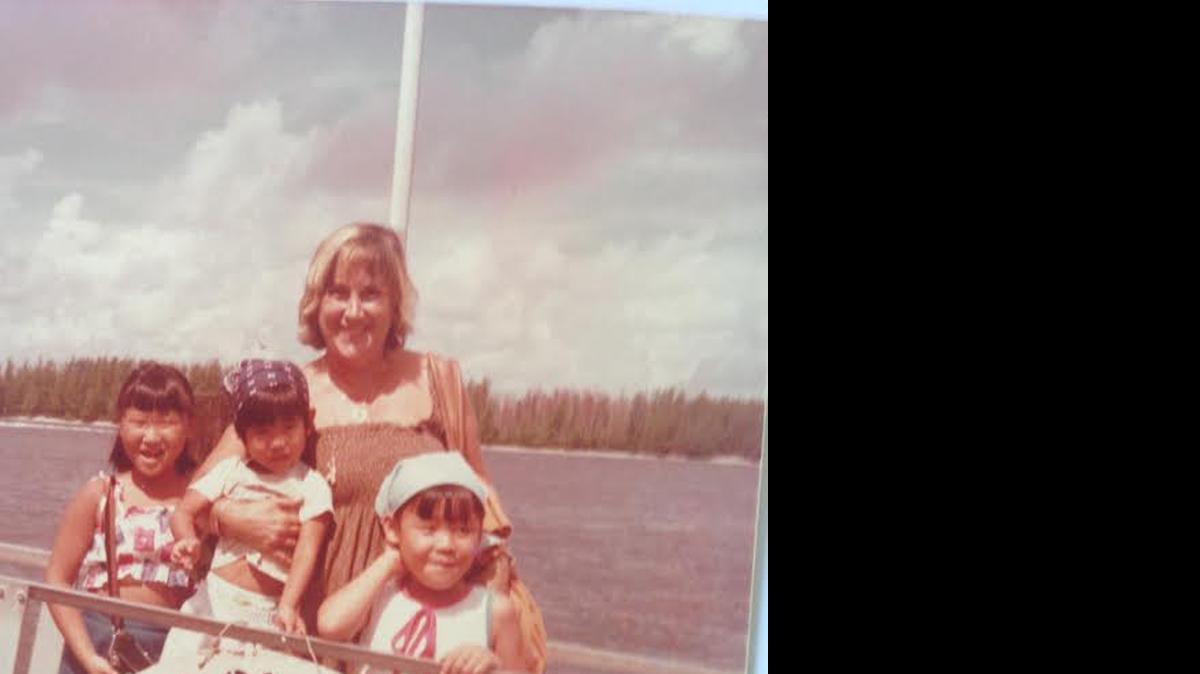 
FAMILY FUN: Lorri Kellogg (center) with three of her adopted children Jamie, Tara and Jillian, from left to right in an old family photo.
