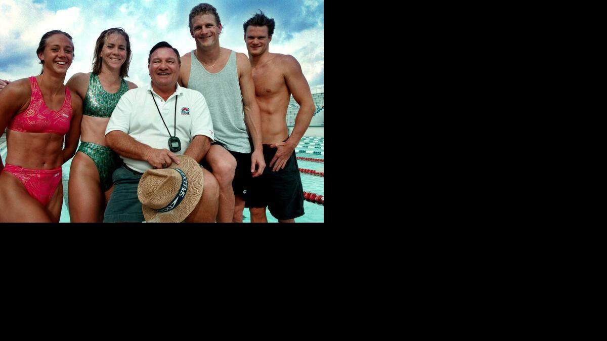 
COACH AND KIDS: In a March 1996 photo from the International Swimming Hall of Fame Pool in Fort Lauderdale, FLST coach Jack Nelson poses with some of his swimmers. (L-R) Susie Geyer, then 22, Susan Gottlieb, then 26, Jack Todd Pace, then 27, and Max Dersch, then 23.
