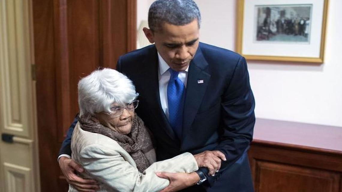 President Barack Obama greets Desiline Victor following the State of the Union address at the U.S. Capitol in Washington, D.C., Feb. 12, 2013.