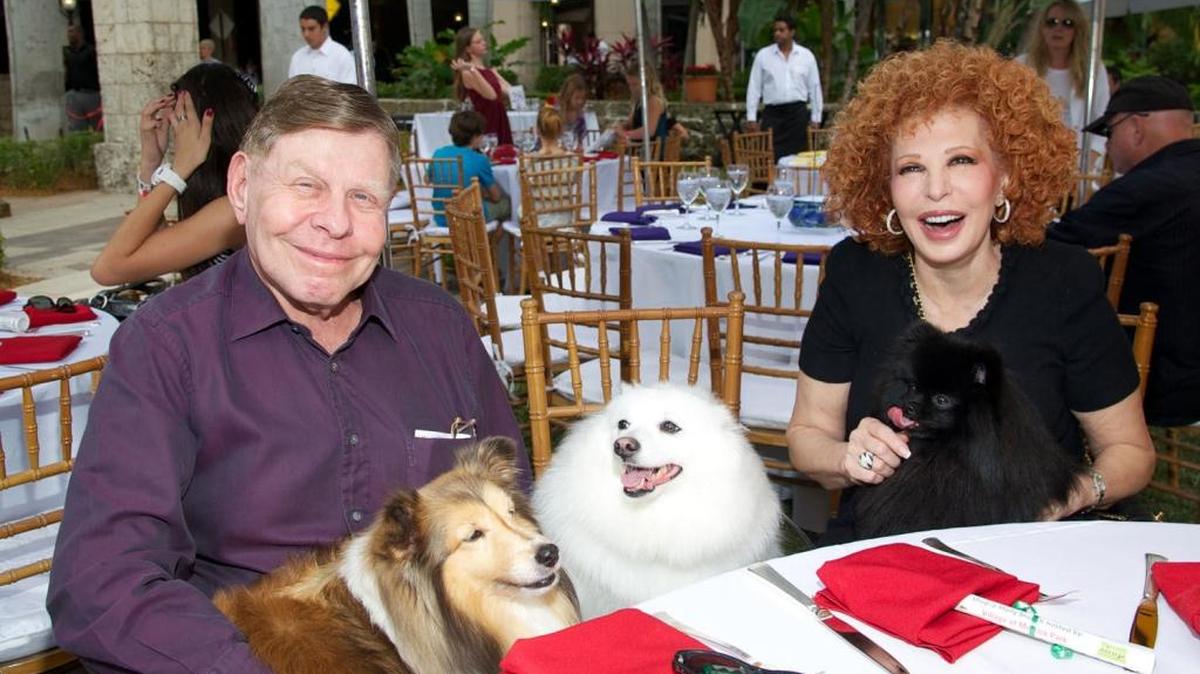 Milton and Patricia Wallace, with their beloved dogs. Pat Wallace was a chairman of the board for the Humane Society of Greater Miami. She chaired its major fund-raising effort, Pawpurrazzi for eight years.