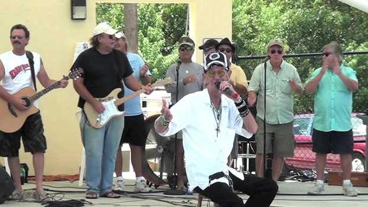 During a daylong music festival at the Marathon Community Park on Sept. 8, 2012, Rocketman performs his signature 'It Beats 40 Below' with many of his musician friends backing him up.