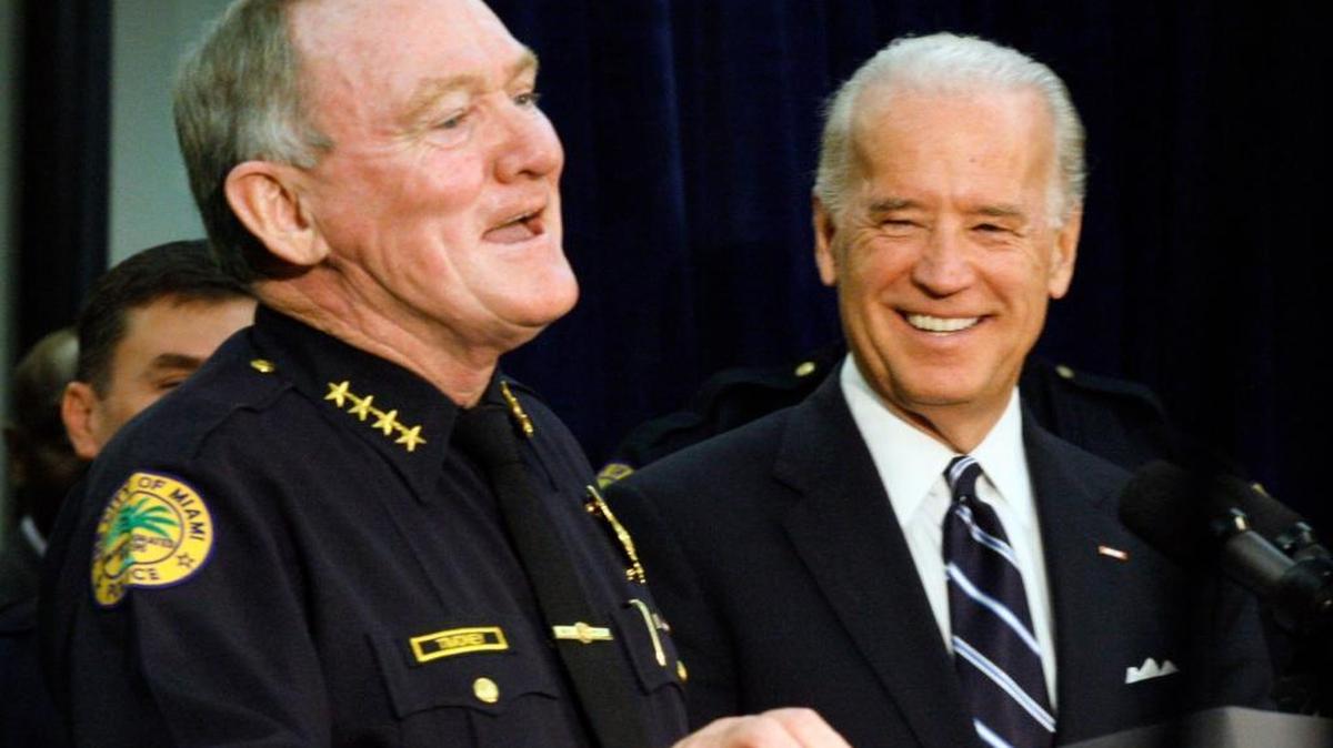 Miami Police Chief John Timoney, left, introduces Vice President Joe Biden during Biden's visit to the Miami Police Department on Friday, March 6, 2009. Joined also by Miami Mayor Manny Diaz, Biden discussed law enforcement investments in the U.S. Recovery and Reinvestment Act and how the federal stimulus package will help law enforcement agencies.