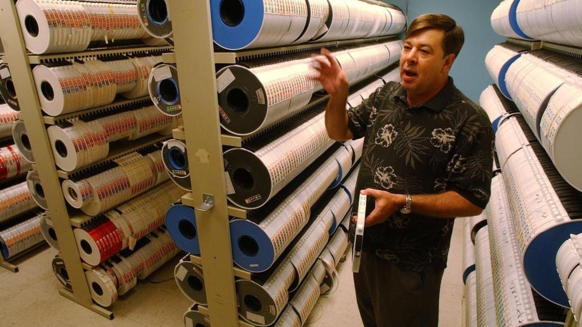 In this May 2005 file photo, Michael Black, a research meteorologist at the Hurricane Research Division of the National Weather Service, talked about the trillions of bytes of data stored on these reels at the center and the need for research funding to analyze the information.
