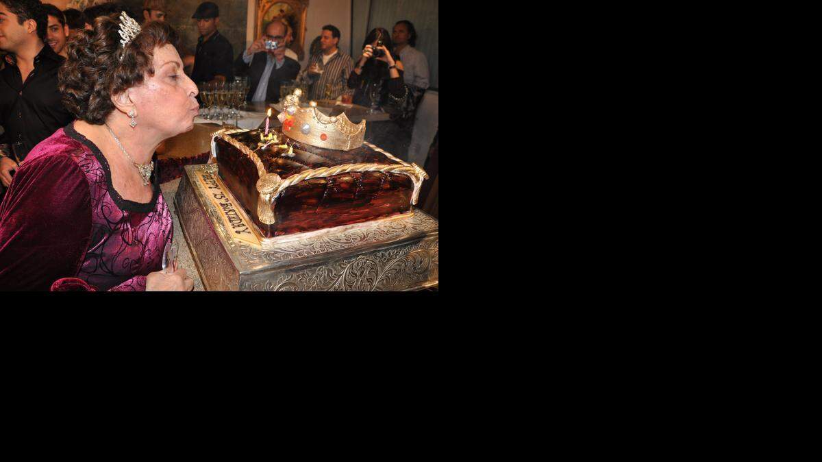 
A HAPPY 75th: Naomi Wilzig blows out the candles at her 75th birthday celebration at her World Erotic Art Museum on Miami Beach, which housed her collection of more than 4,000 pieces.


