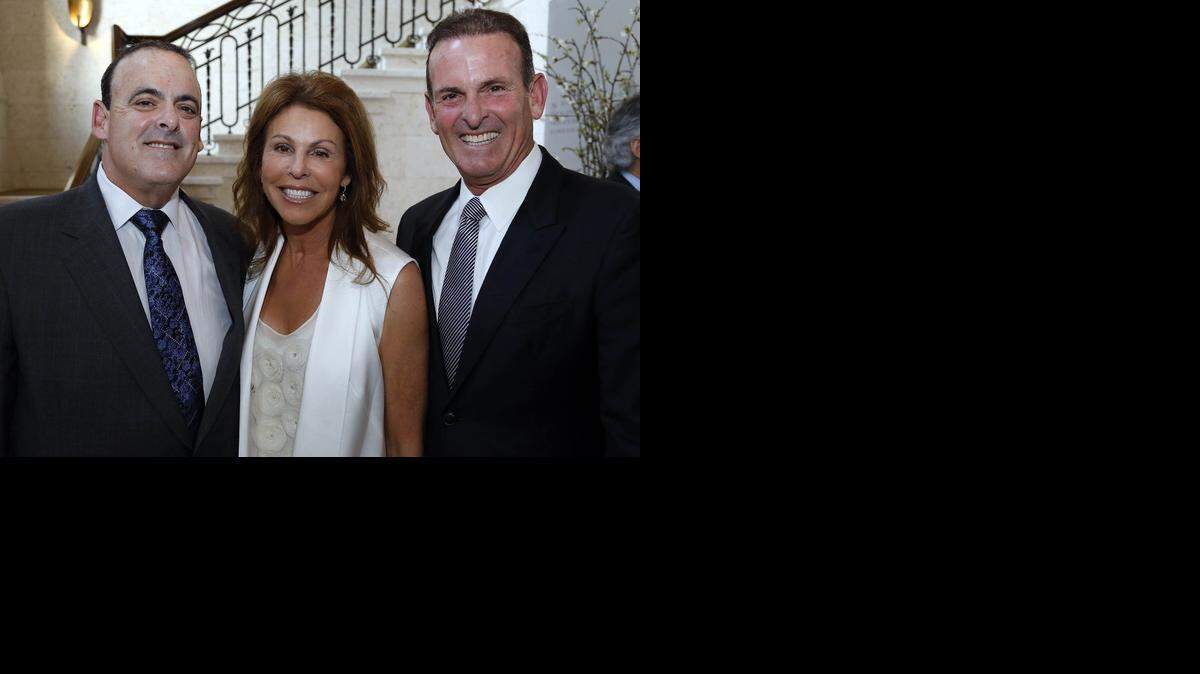 
The three Miller siblings — Stuart, Jeff and Leslie Saiontz — are getting United Way's highest honor, the Tocqueville Award for Outstanding Philanthropy, on Wednesday, March 11, 2015. From left to right: Jeffrey Miller, Leslie Miller Saiontz, Stuart Miller.
