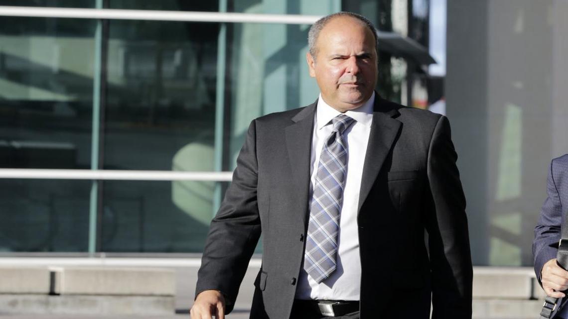 Sports agent Bartolo Hernandez leaves federal court, Wednesday, Feb. 1, 2017, in Miami. Opening statements were held in the case against Hernandez, and trainer Julio Estrada, both of whom have pleaded not guilty to conspiracy and alien smuggling charges. They are accused of illegally smuggling Cuban baseball players from the communist island to the U.S.