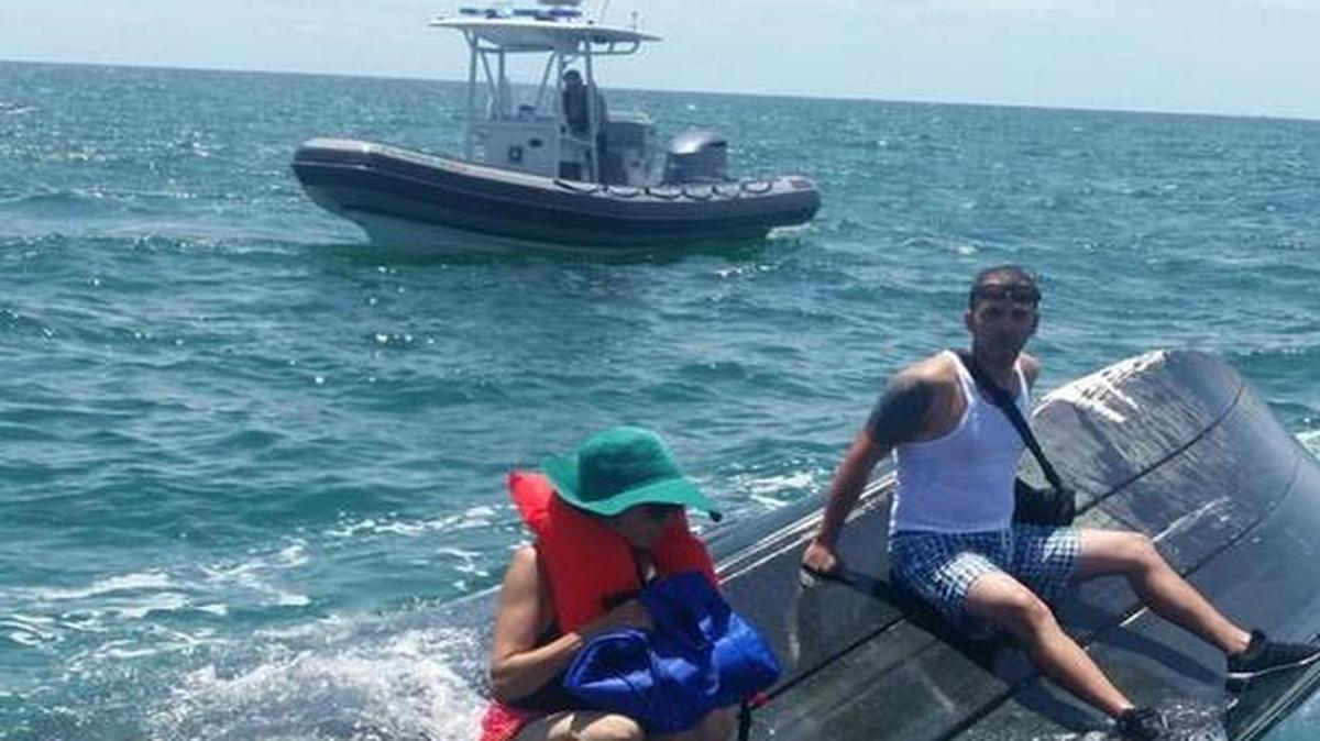 The coast guard rescued six boaters whose vessel capsized Saturday.