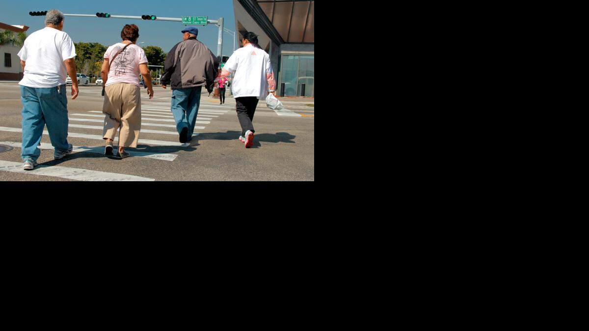
Elderly couples cross a Little Havana street. Florida consistently ranks as the worst state for pedestrian safety.
