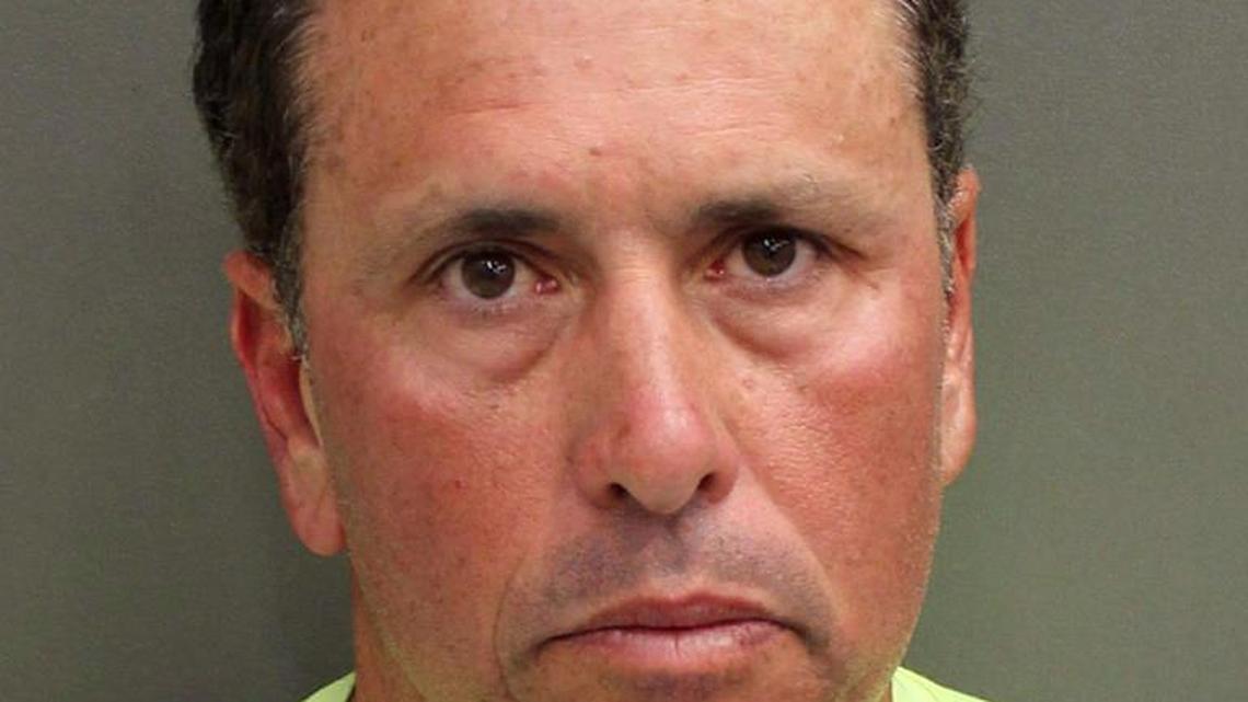 This undated file photo provided by Orange County Corrections shows Gustavo Falcon, the last of South Florida's "Cocaine Cowboys." Falcon was arrested Wednesday, April 12, 2017, some 26 years after he went on the lam, while on a 40-mile bike ride with his wife near the Orlando suburb where they apparently lived under assumed names. Falcon makes his first court appearance in Miami, Tuesday, April 25, 2017.