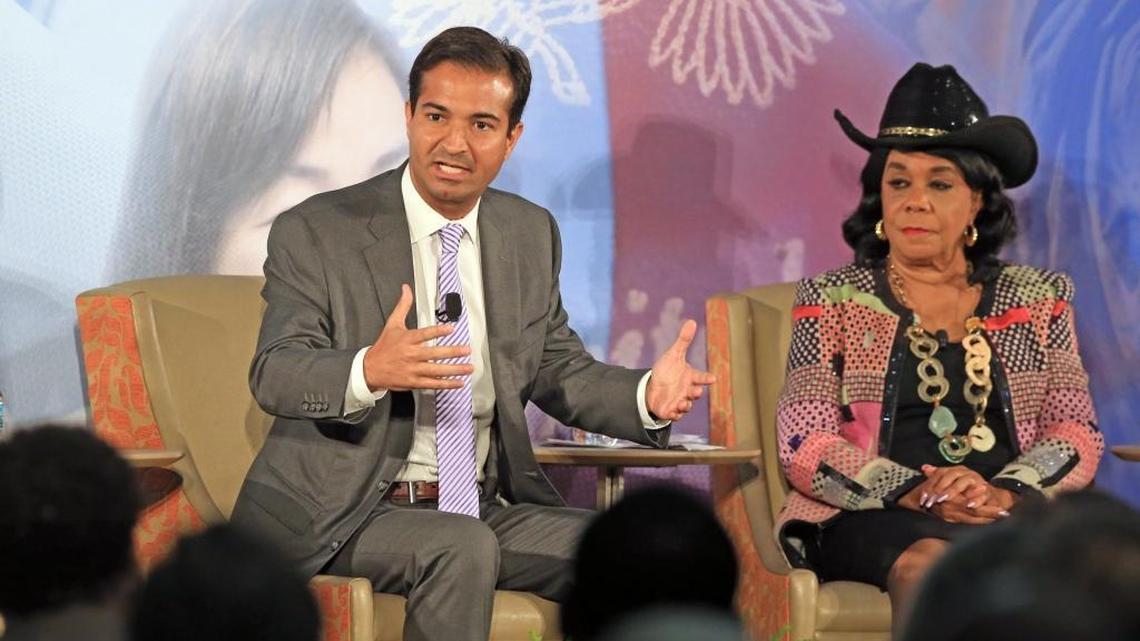 Republican Rep. Carlos Curbelo and Democratic Rep. Frederica Wilson talk about the future of politics and immigration during the IMPAC Fund Immigration Summit Agenda at the University of Miami Newman Alumni Center on Tuesday, Nov. 28, 2017.