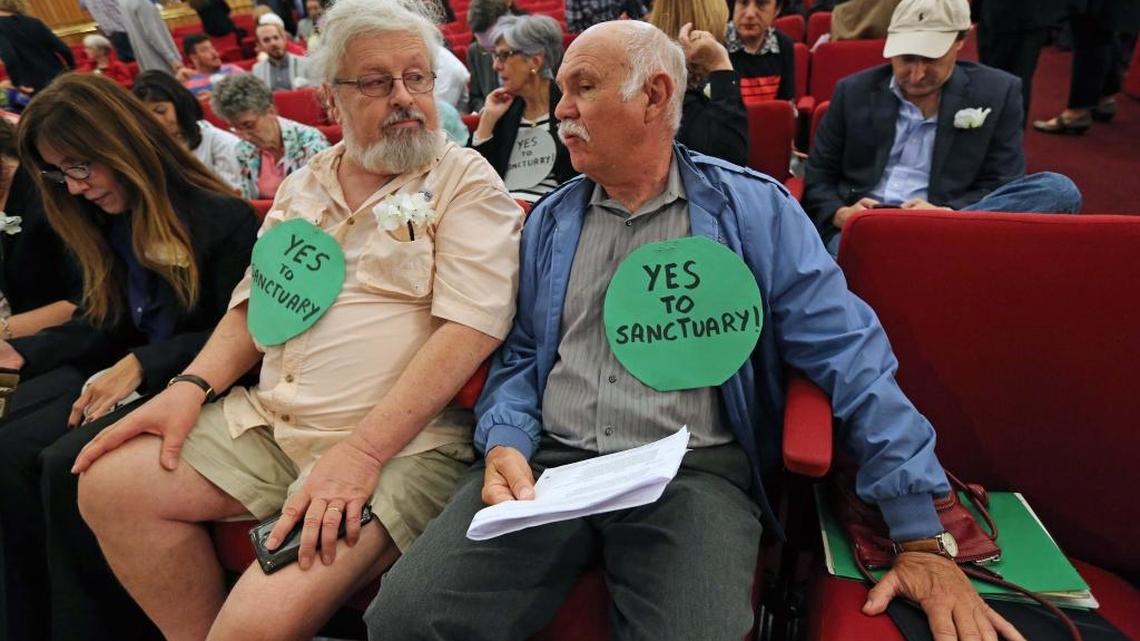 Bud Conlin and Alejo Vada attended a Miami-Dade County Commission meeting earlier this month to protest a vote to end the county’s ‘sanctuary’ status for undocumented immigrants.