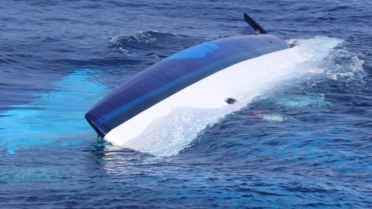 The Coast Guard is searching for a woman who went missing after her boat capsized in the Florida Straits.