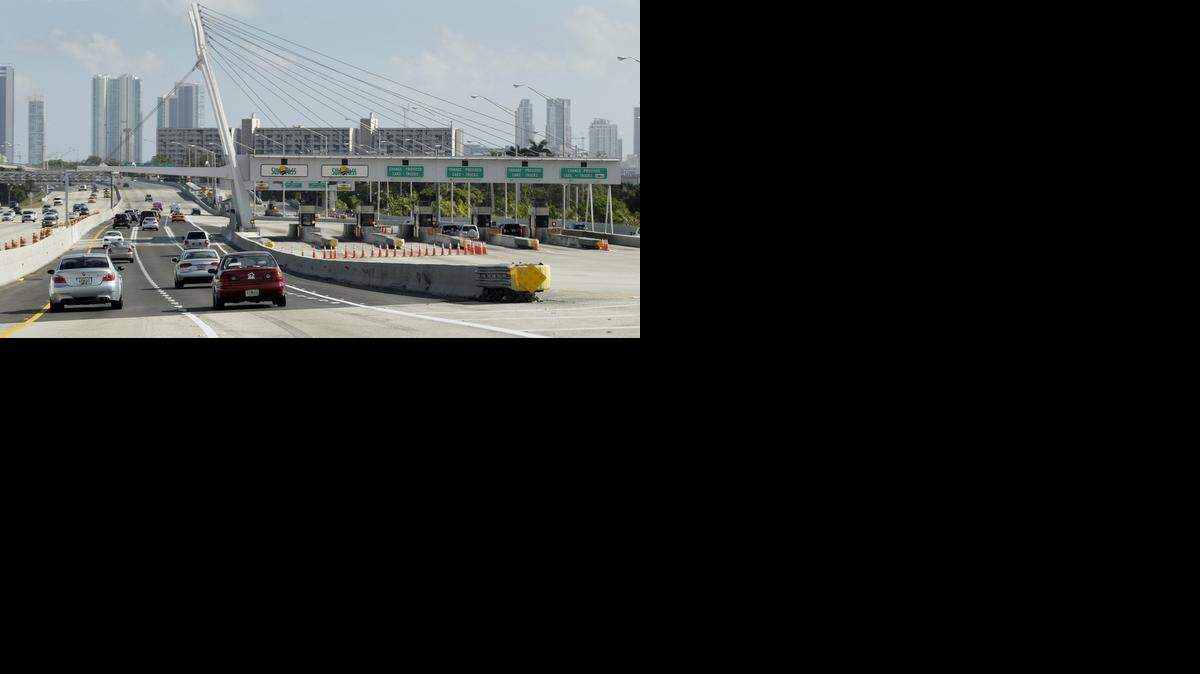 
FILE--The 836 Eastbound Toll plaza will eventually be replaced for a complete automatic Sunpass situation.
