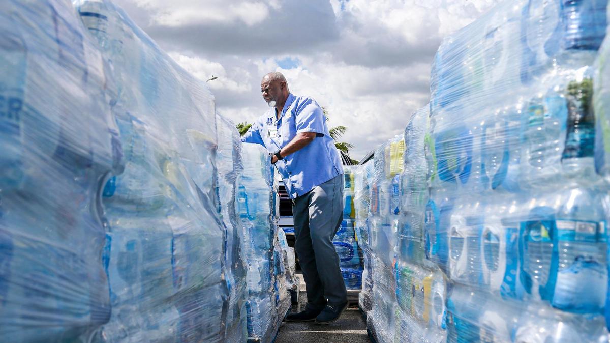 Miami Gardens Operations Manager Frank Johnson gets ready to load pallets of water cases into a UPS truck to be shipped to Jackson, Miss., at Betty T. Ferguson Recreational Complex park in Miami Gardens on Monday, Sept. 12. 2022.