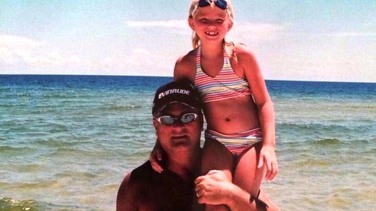 Bailey Sellers, as a child, perched atop her father Michael William Sellers at the beach. Sellers shared this photo on Twitter on her 21st birthday on Nov. 24, 2017, along with the flowers and card her dad arranged to have sent to her. He pre-paid for five years worth of deliveries, from her 16th birthday to her 21st, before he died of cancer at 56.