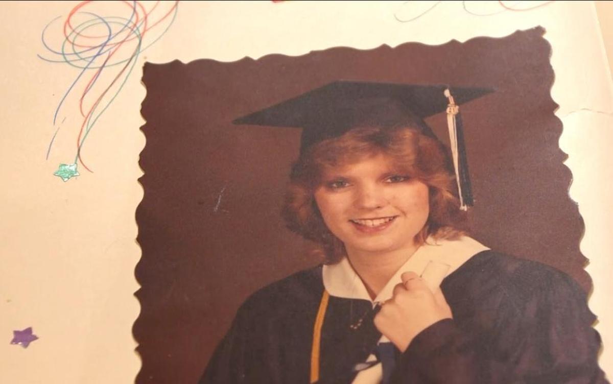 A photo of Debbie Wesson Gibson when she was a high school senior, as seen in a scrapbook she kept during her senior year at Etowah High School.