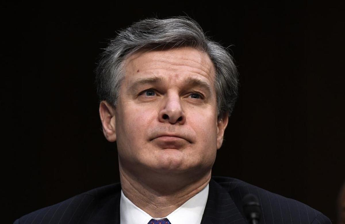FBI Director Christopher Wray testifies before the Senate Intelligence Committee for a hearing focusing on global threats on Feb. 13 in Washington, D.C., the day before a South Florida 19-year-old fatally shot 17 students and faculty at a Parkland high school.