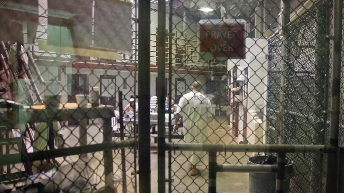 A cooperative captive is seen through one-way glass inside a communal cellblock at Camp 6, at the U.S. Navy base at Guantánamo Bay, Cuba, on Tuesday, Feb. 9, 2016, in this photo approved for release by the U.S. military.