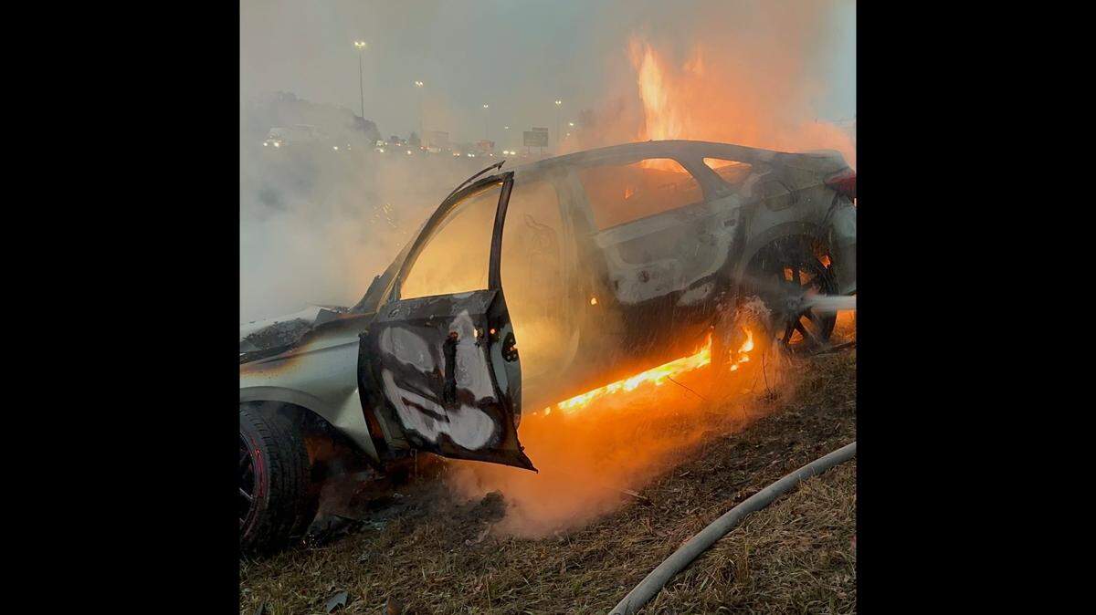 A car went up in flames after a driver crashed into a tree alongside Interstate 75 in Florida, and a paramedic on his way to work stepped in to help.