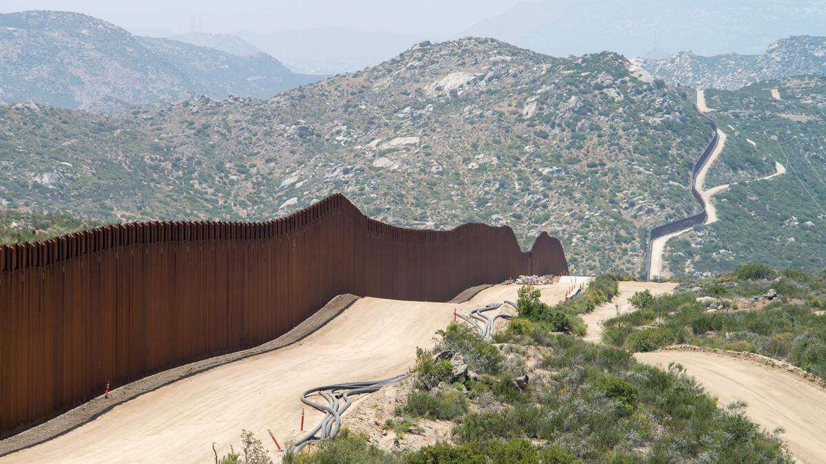 President Donald Trump’s administration announced the “entire” U.S.-Mexico border wall will be painted black to deter migrants. Will it work? Experts weigh in.