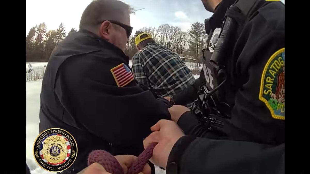 Officers worked together to pull a 1,300-pound horse from an icy pond in upstate New York, video shows.