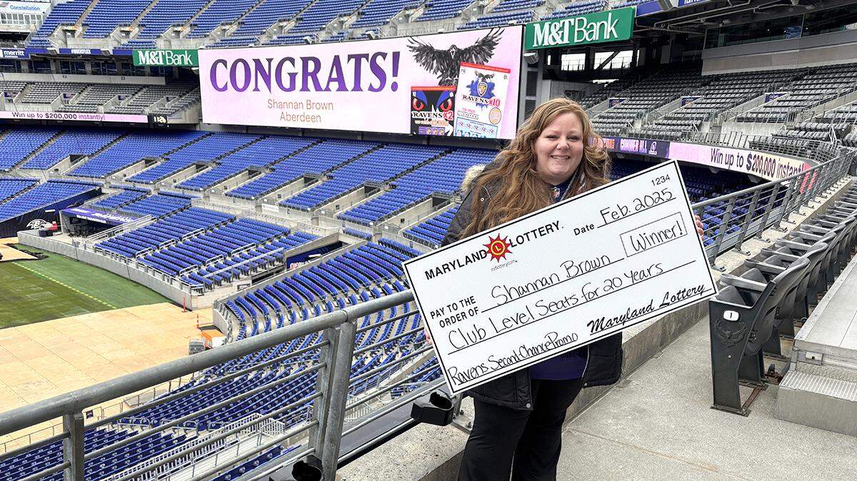 A big Baltimore Ravens fan won seats for the next two decades of games in the Maryland lottery, officials said.