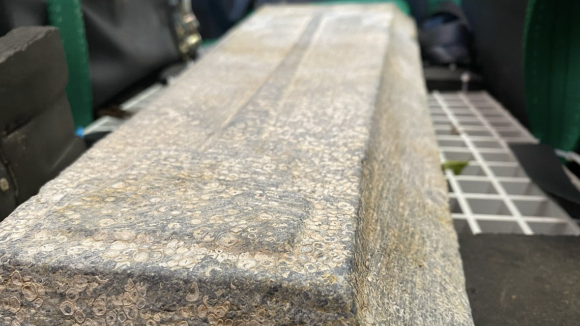 Two medieval grave slabs were recently recovered from a 13th century shipwreck off the coast of England, researchers said.