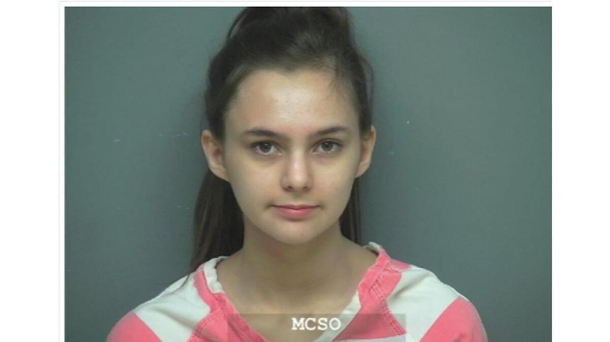 Police say a 17-year-old girl was behind an armed robbery and carjacking of her and her father in Texas.