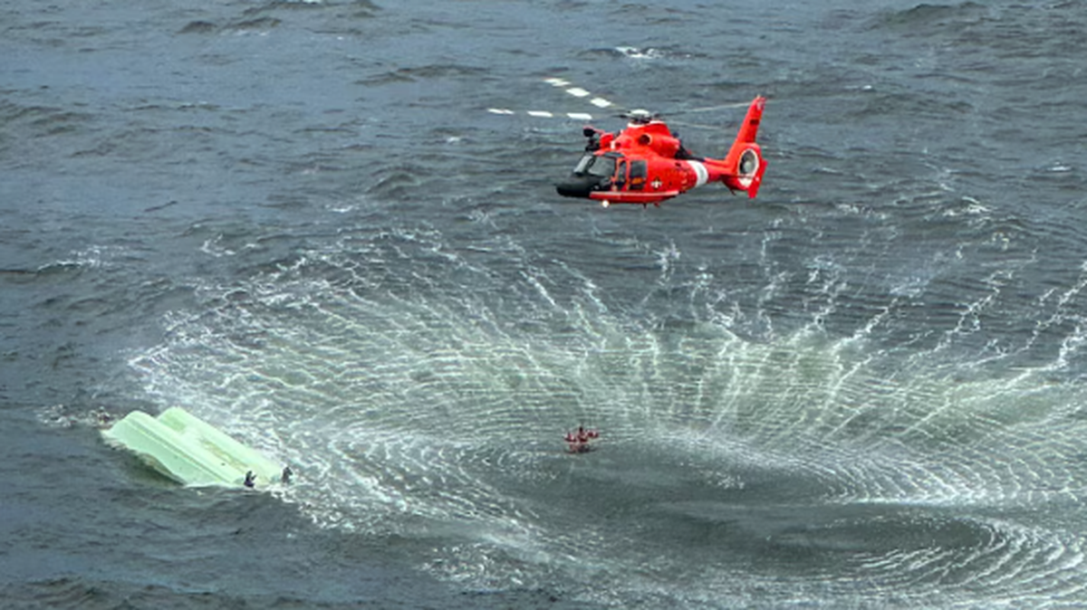 A helicopter was used to airlift four people from the water May 30 near Dauphin Island, Alabama, after their boat capsized, officials said.
