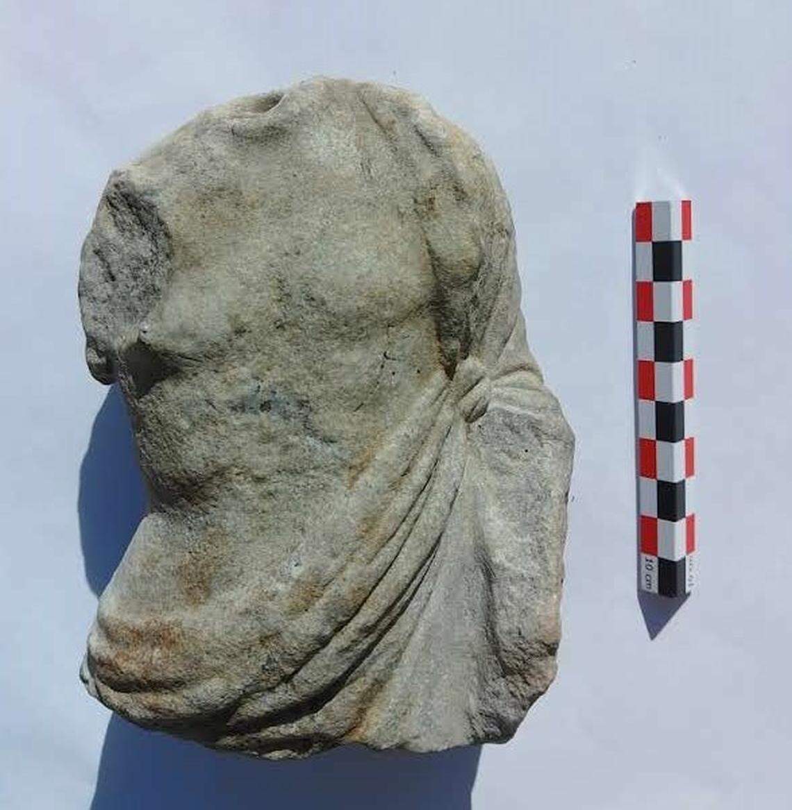 Fragment of a marble statue of Asclepius that dates to the late fourth century B.C.
