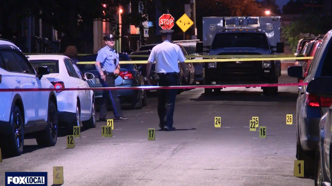 A man was shot and killed by two gunmen who had approached a home riding a scooter, police say.