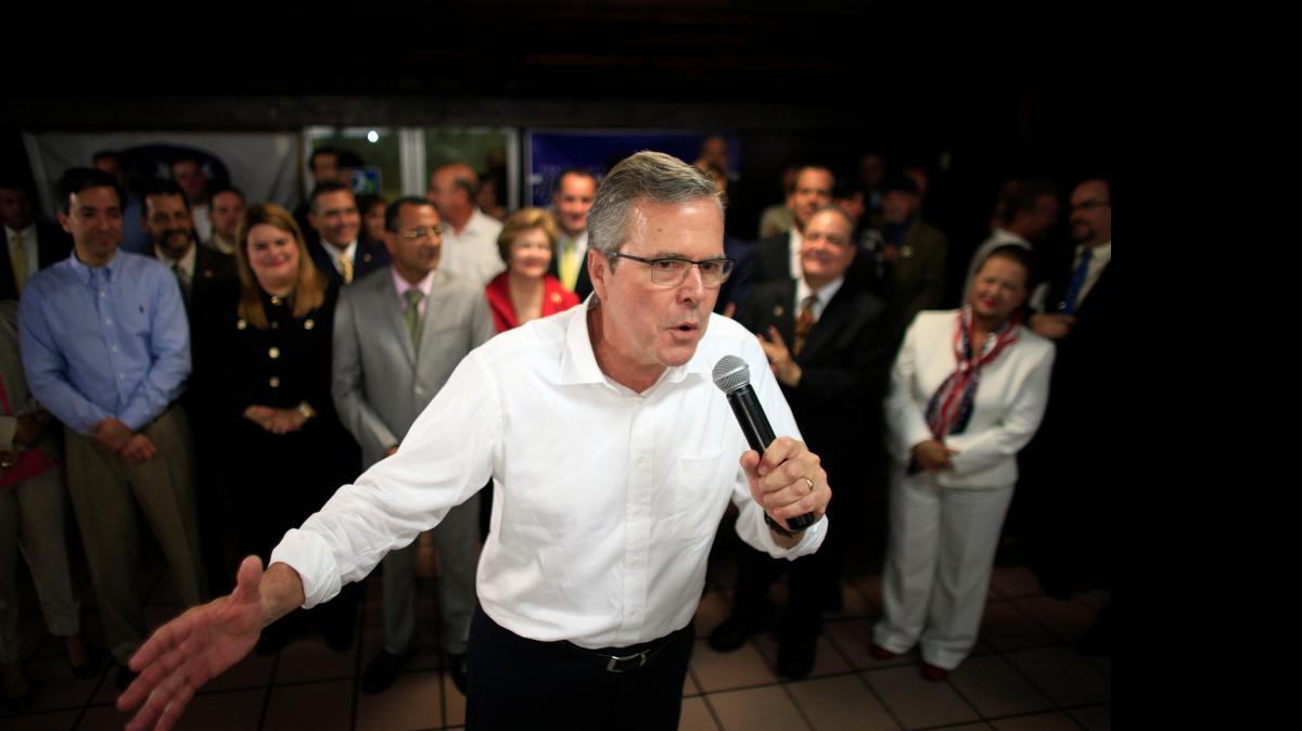 
In this photo taken April 28, 2015, Jeb Bush speaks during a town hall meeting with Puerto Rico's Republican Party in Bayamon, Puerto Rico. Hillary Rodham Clinton's challenge to the GOP on immigration is an early counter to Jeb Bush and other Republican White House contenders seeking Hispanic voters. Among them are GOP lawmakers who once opposed an immigration overhaul in Congress but now say they may be willing to allow millions living in the country illegally to stay.
