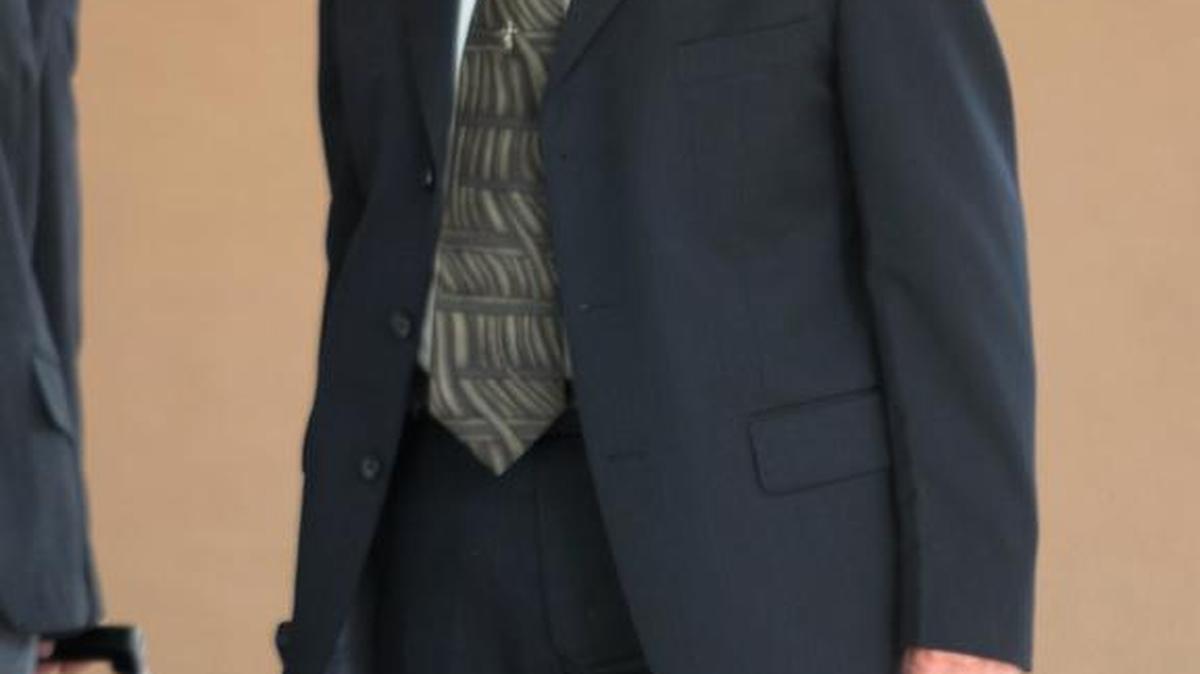 Jose Guillermo Garcia enters Miami’s downtown immigration court in February 2013.