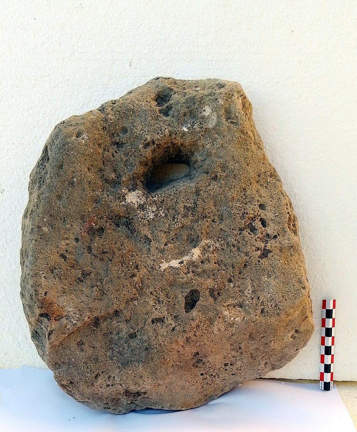 Stone anchor featuring a hole for a mooring rope