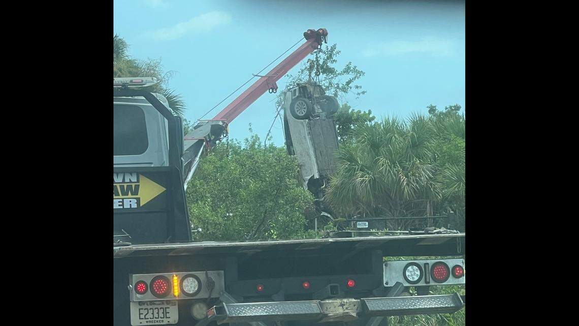 A Tesla overturned in a cluster of mangroves near a Hillsborough County bridge, sending the driver into the water, Florida Highway Patrol said.