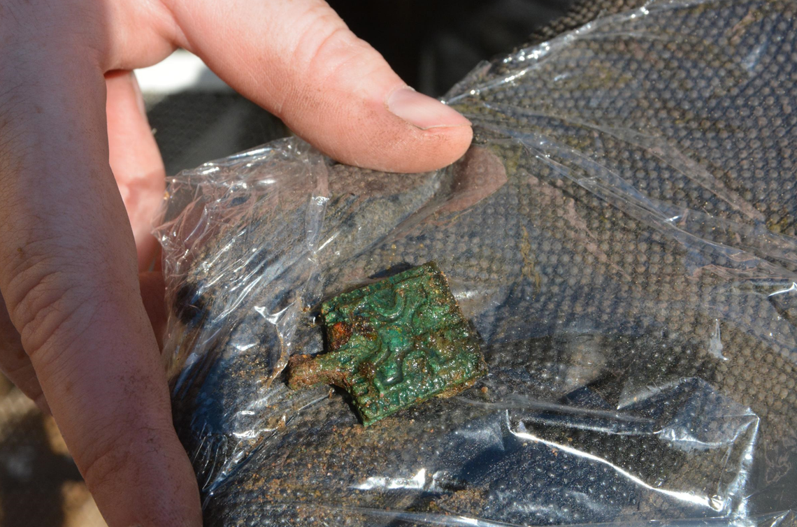 A bronze ornament that was part of a belt