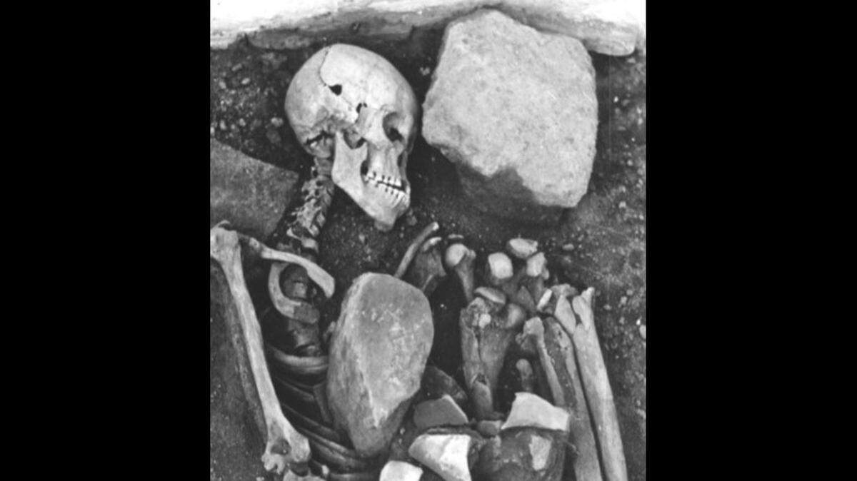A mysterious 500-year-old skeleton buried in the palace of Hernan Cortes was recently identified as belonging to an Aztec woman, officials said.