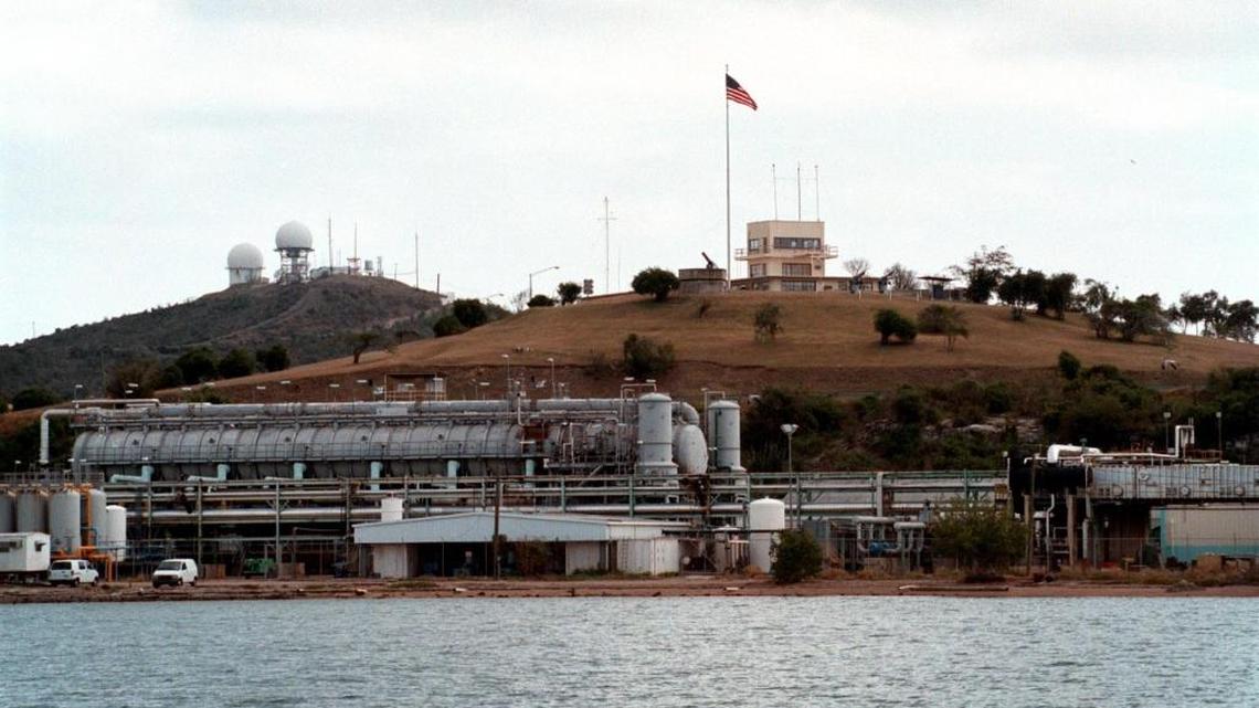 An American flag flies high over the U.S. Navy base at Guantánamo on March 18, 1999 during a reporting visit by the Miami Herald on demining operations.