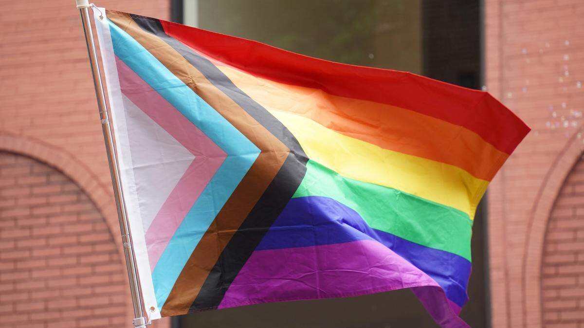 A man faces several charges after he allegedly terrorized a New Jersey donut shop that displayed a Pride Flag in front of the business, cops say.