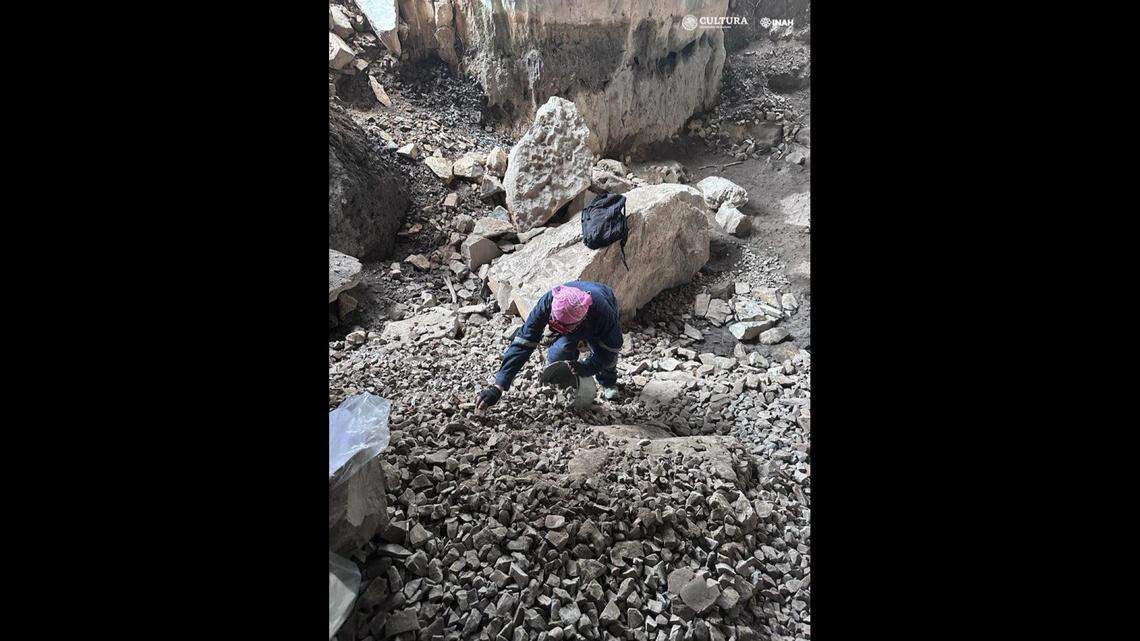 The remains of a 2,500-year-old baby, who may have been buried alive, were discovered in a cave in Mexico, officials said.