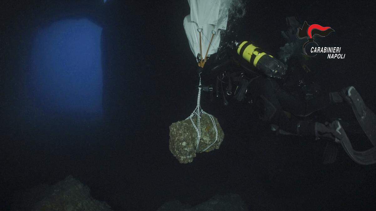 Divers recovered fragments of an ancient marble statue from a sea cave in Capri, Italy, officials said.