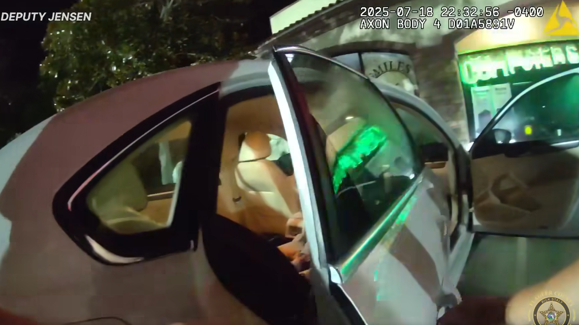 Law enforcement said they found an unattended child in a running, unlocked car outside a bar in Florida and arrested the parents.